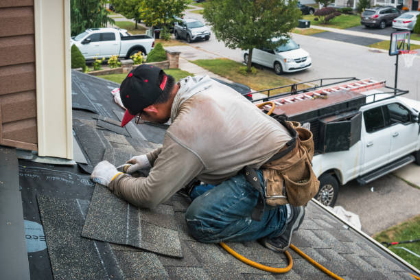 Professional Emergency Roof Repair technician working in Ferrisburgh, VT